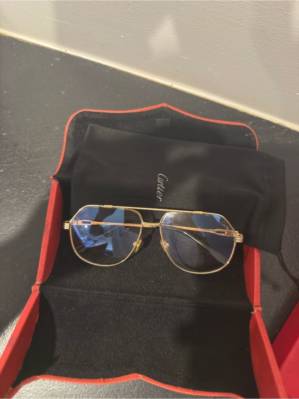 Cartier Gold Frames with Blue Lenses